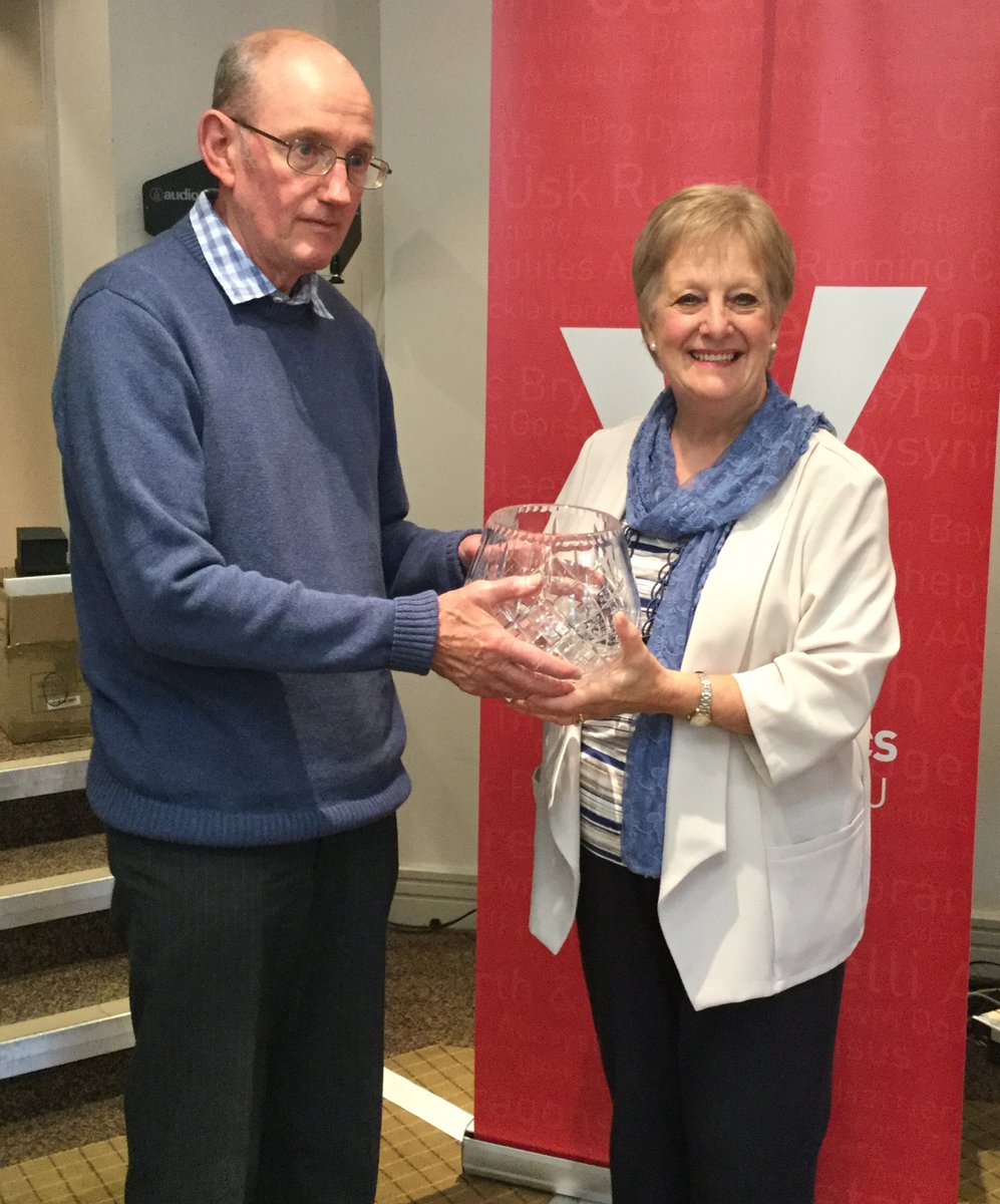 David receiving award from Carol Anthony